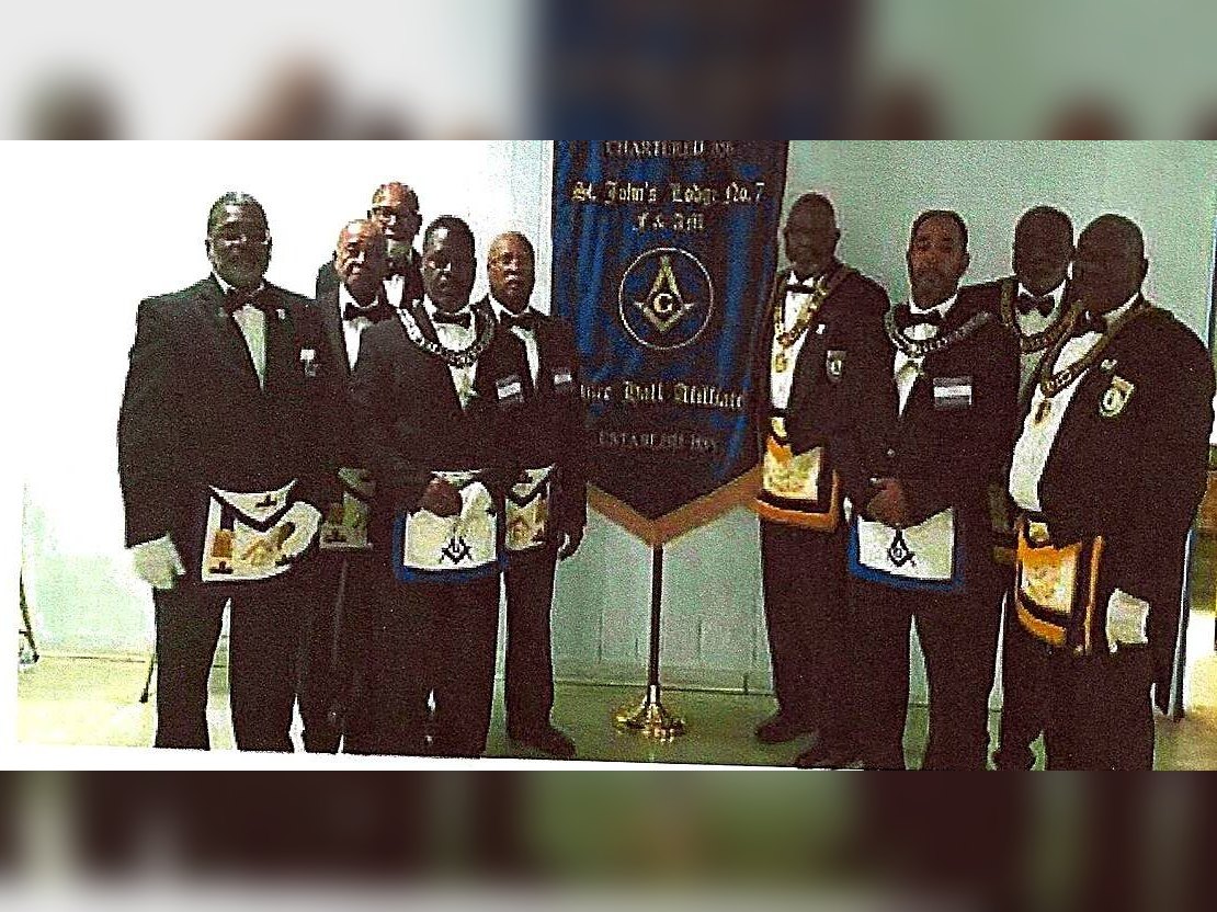 Brethren of St. John’s Lodge No. 7 with the lodge banner