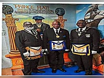 Brethren before the Prince Hall mural