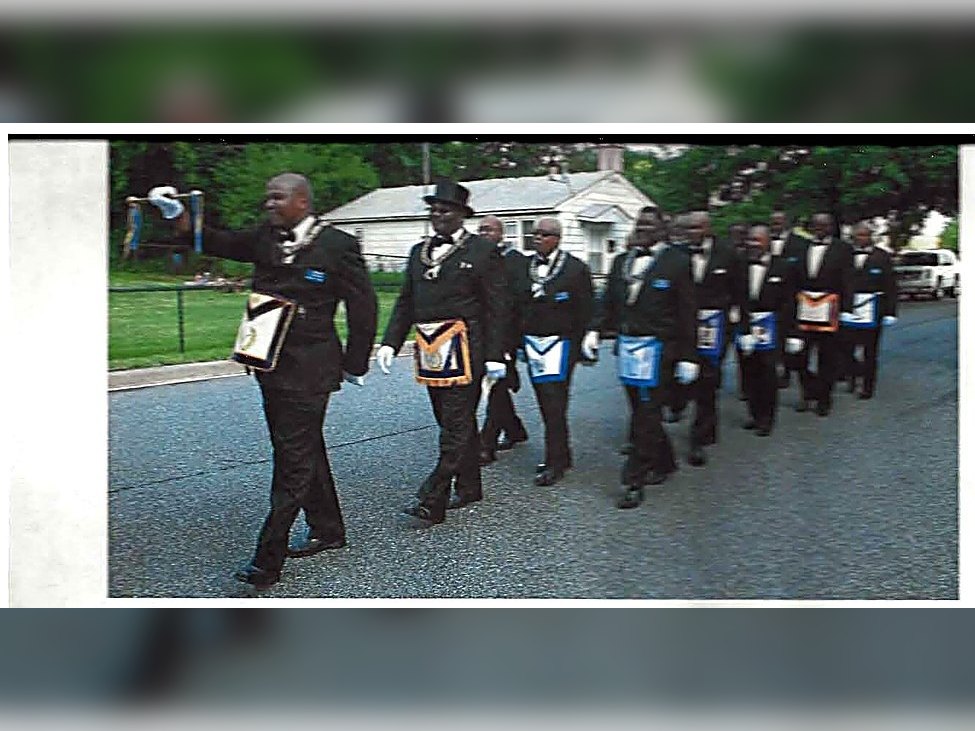 St. John’s Lodge No. 7 brethren marching in procession